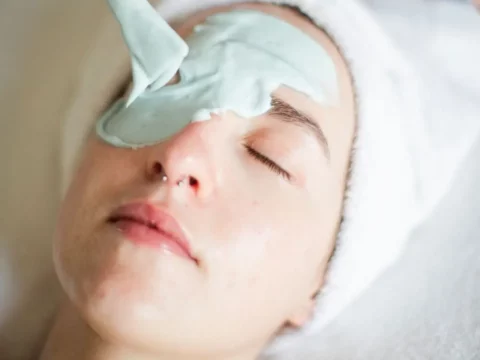 Facial Being Applied to Woman in Spa