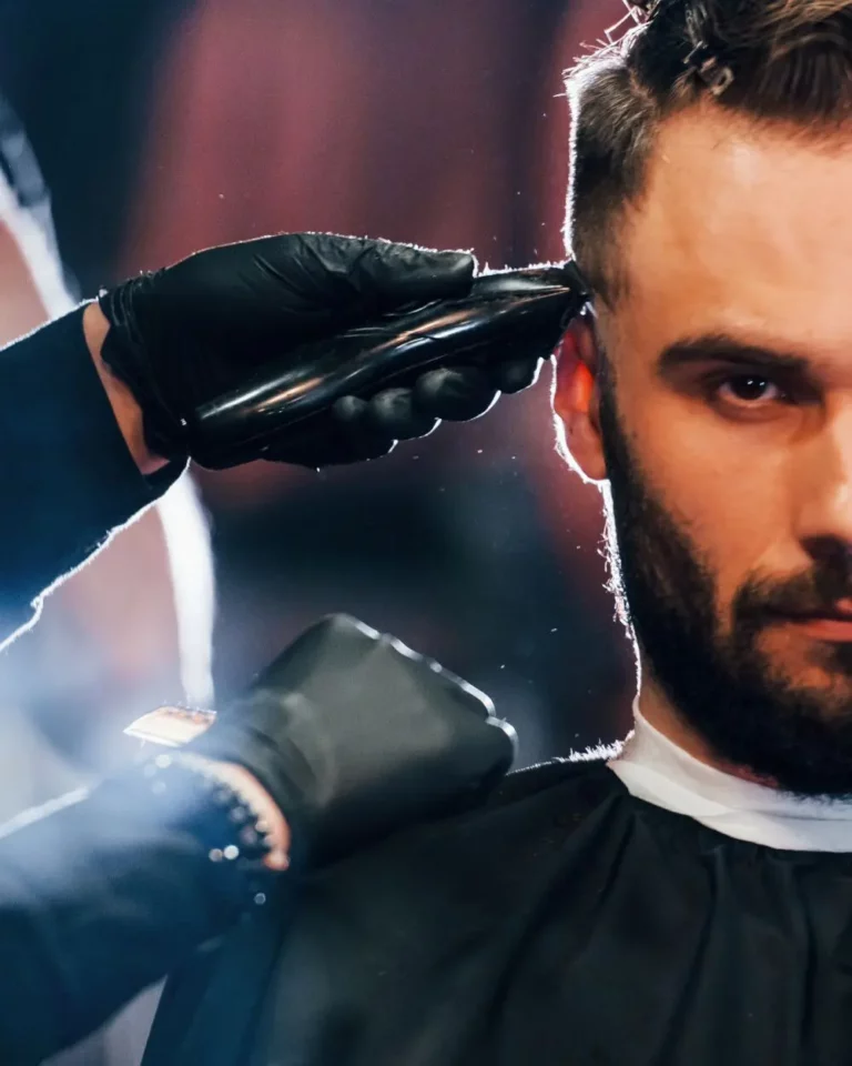Man Gets Hair Trimmed at Hair Salon