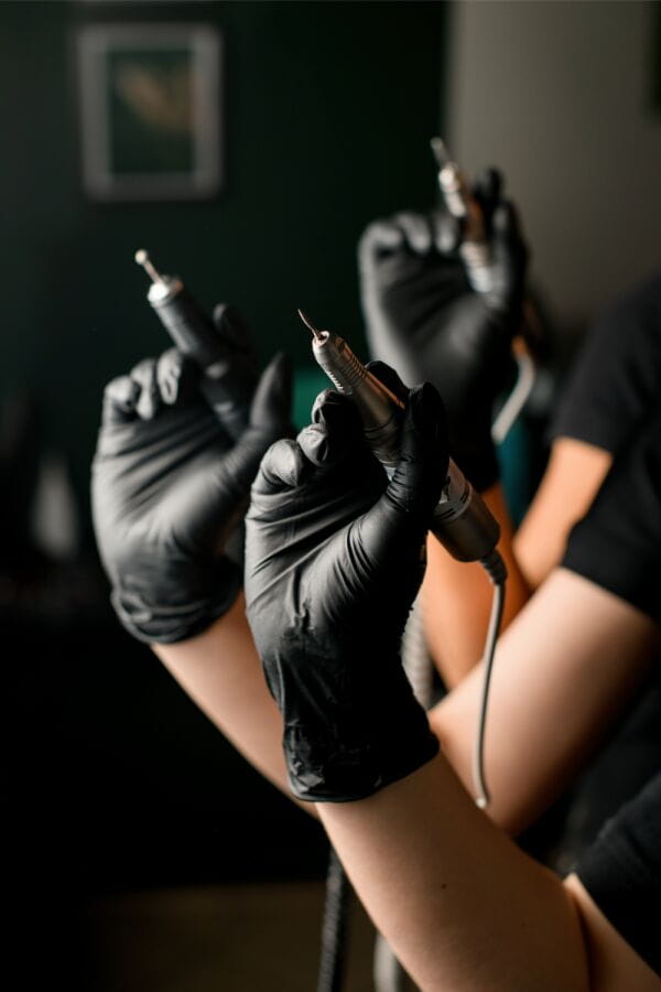Nail Technicians With Their Gel Nail Removal Tools
