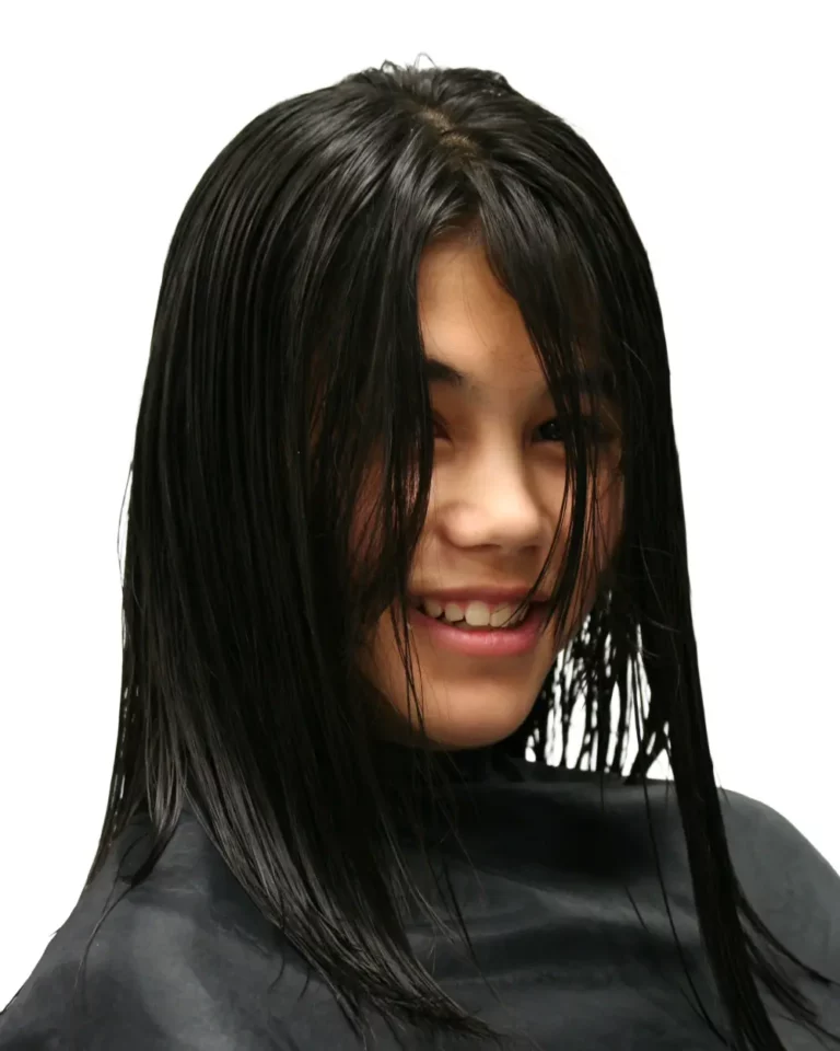 Teenager With Wet Hair Getting it Cut
