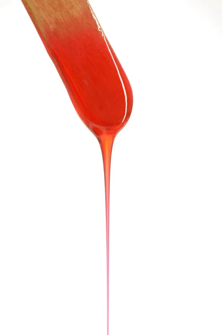 Wax Dripping Off an Applicator